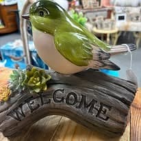 Green bird welcome decoration available at Edge of Town